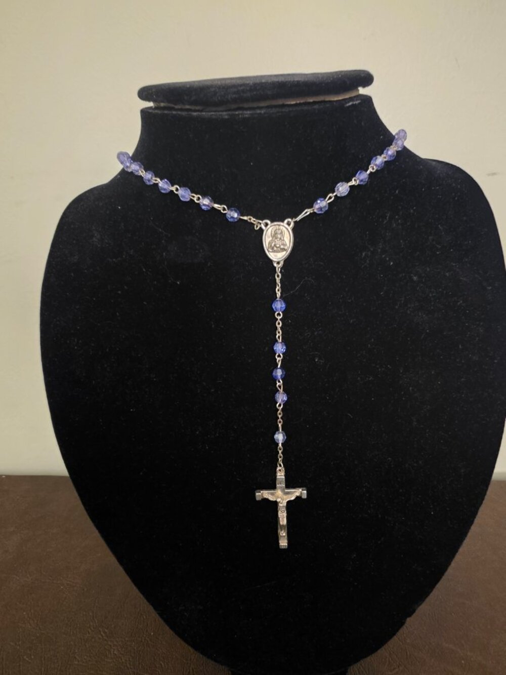 Vintage Art Deco blue glass rosary features a white metal cross - Preowned